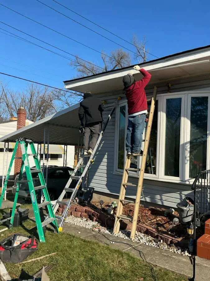 Restoration crew performing exterior repair in Lewisville